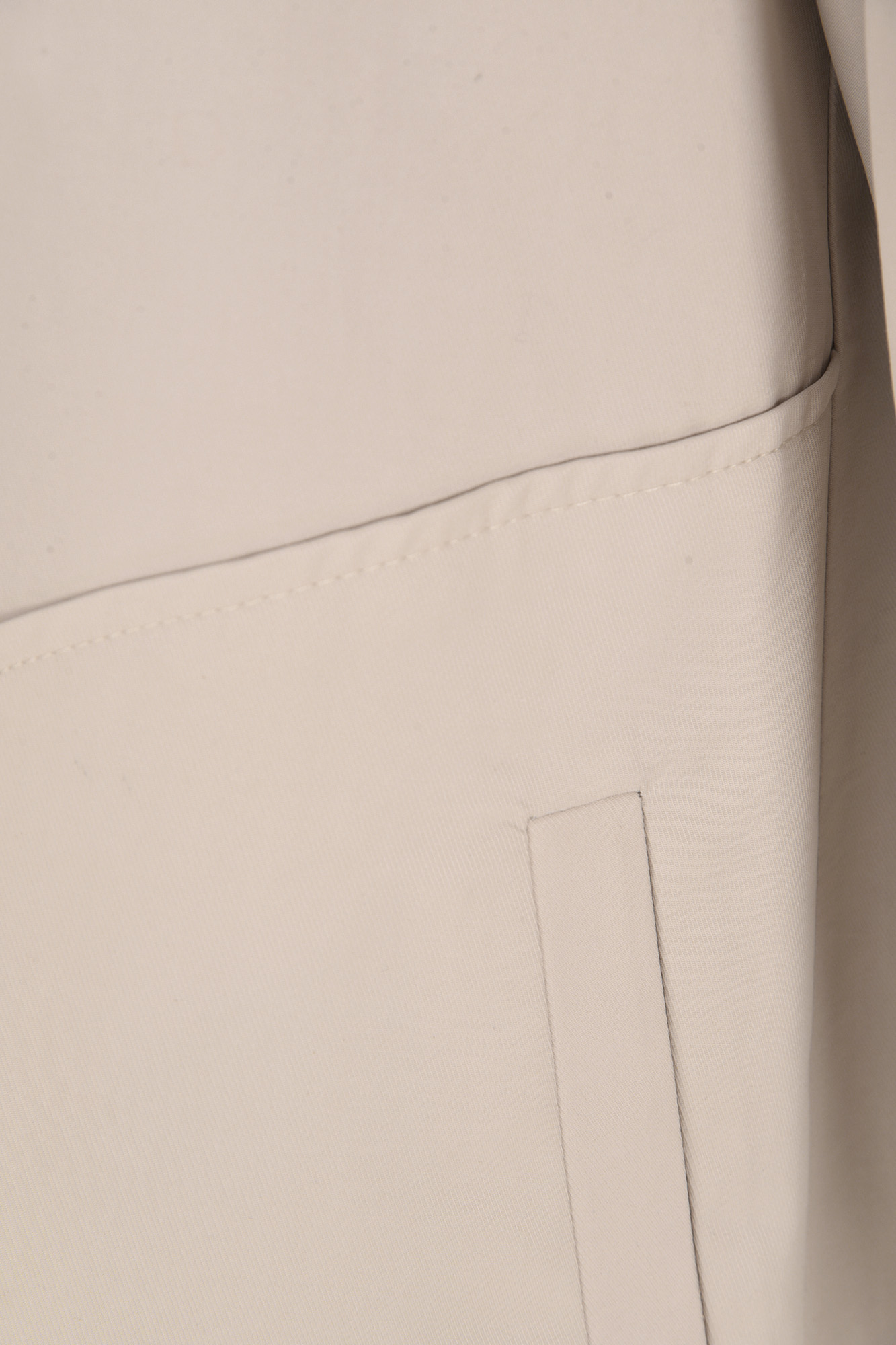 بارانی آستین رگلان جیب برش دار