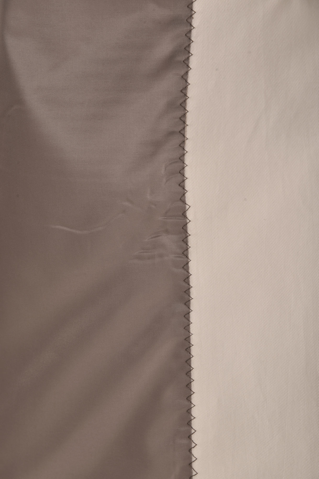 بارانی آستین رگلان جیب برش دار