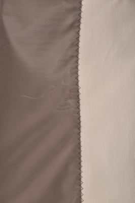 بارانی آستین رگلان جیب برش دار