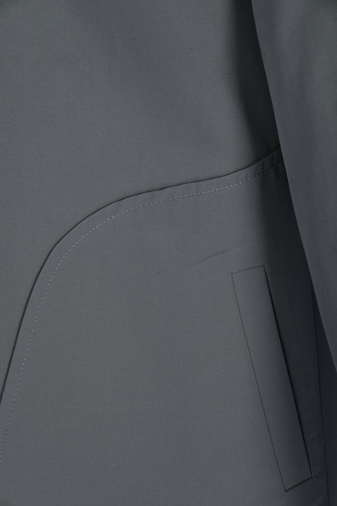 بارانی آستین رگلان جیب برش دار