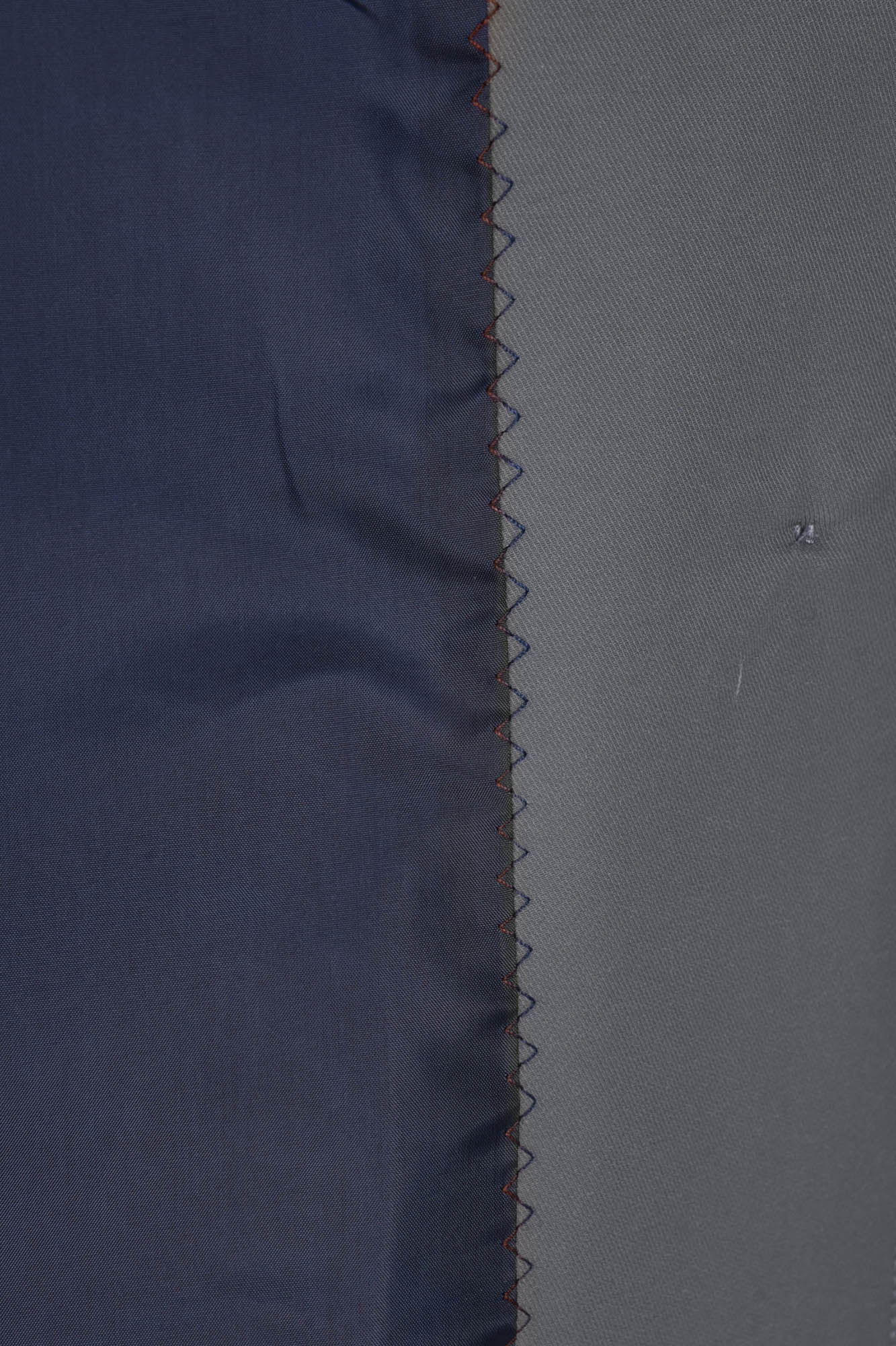 بارانی آستین رگلان جیب برش دار