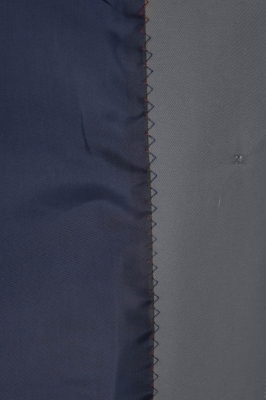 بارانی آستین رگلان جیب برش دار