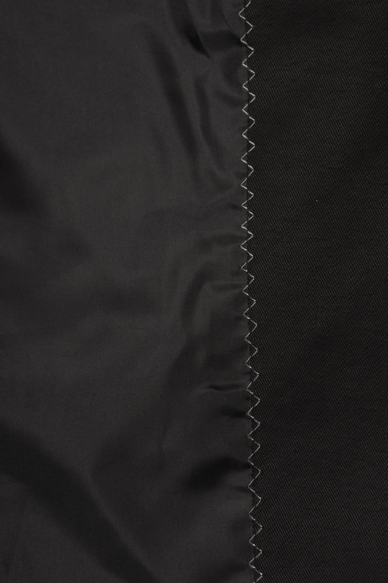 بارانی آستین رگلان جیب برش دار